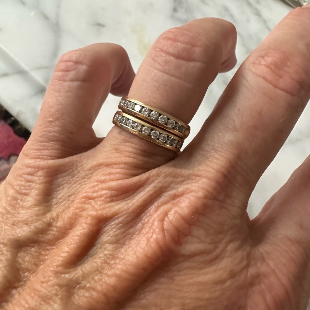 (2) 14k golden diamond stacking bands. Size 7.